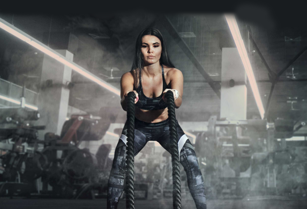 woman working out with ropes