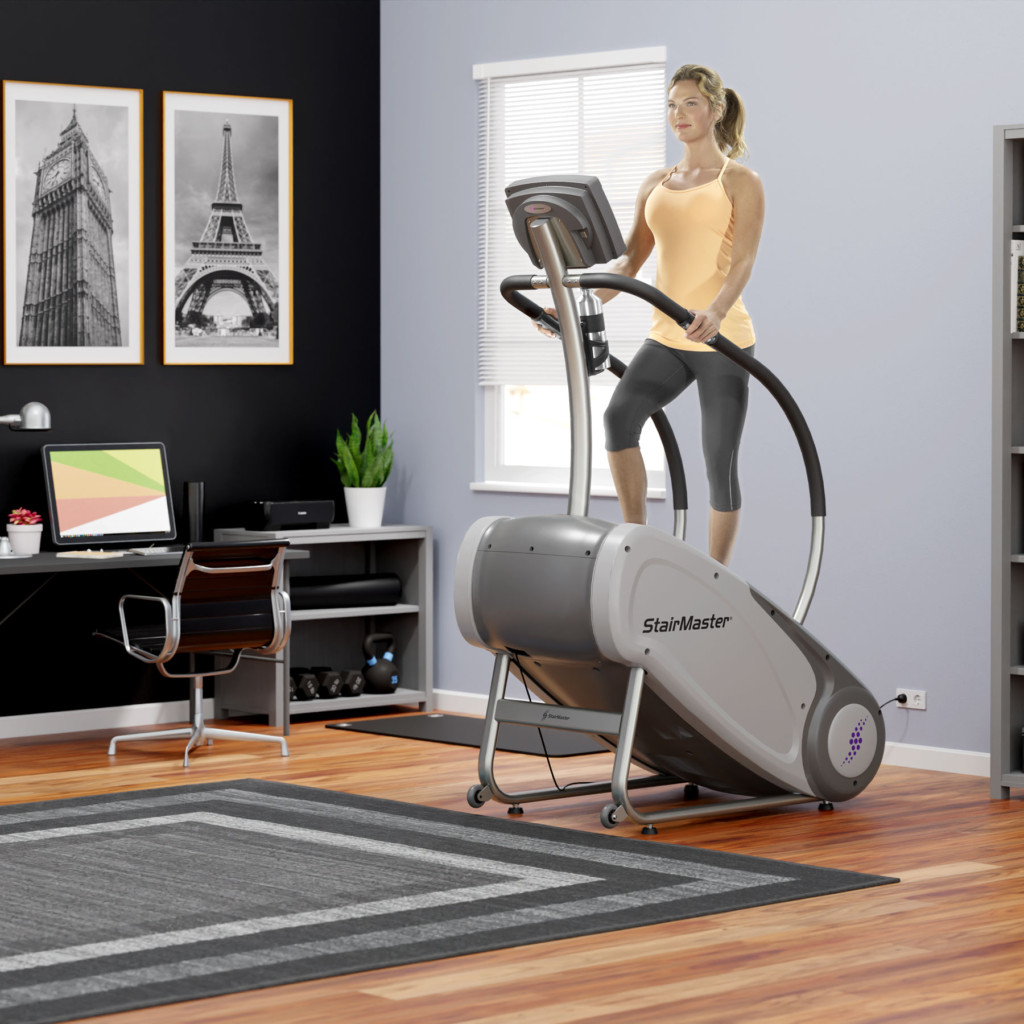 woman using stepper in her home gym