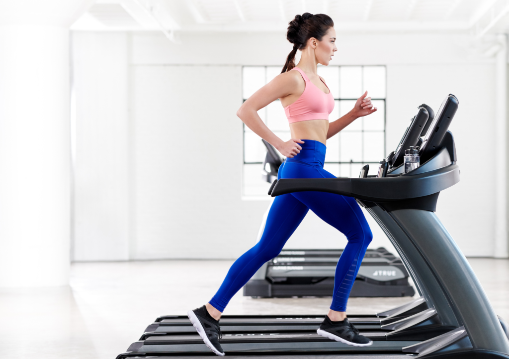 woman running on treadmill